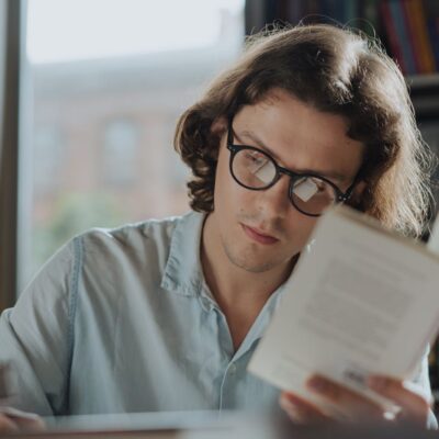 man reading book picture