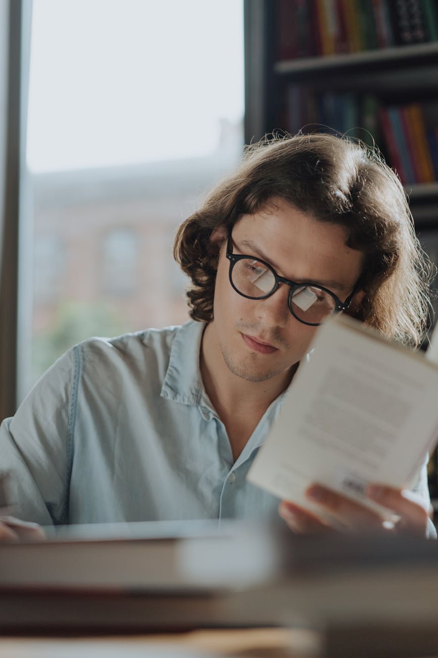 man reading book picture