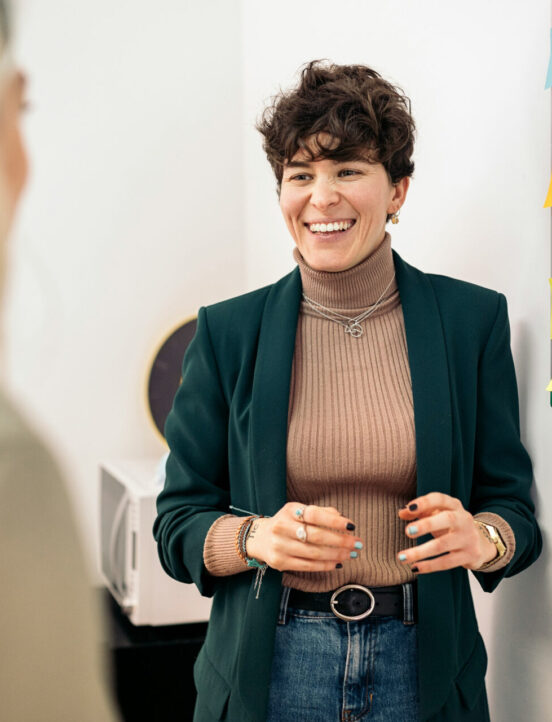 woman presenting at whiteboard picture